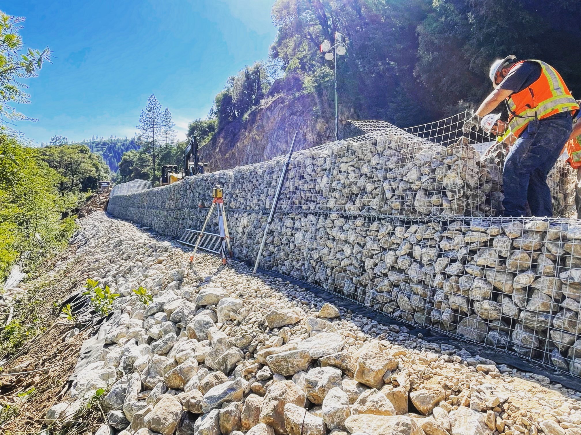 Rock pile retaining wall