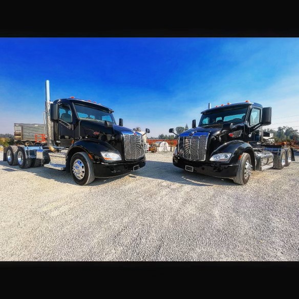 Two JSH semi trucks